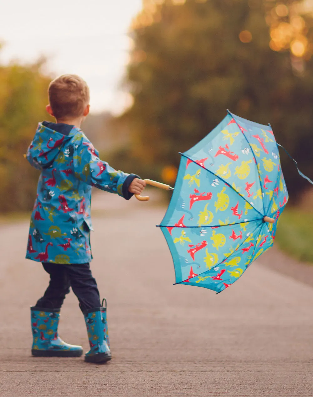 CLEARANCE: Blue Dinosaurs Lined Rain Jacket