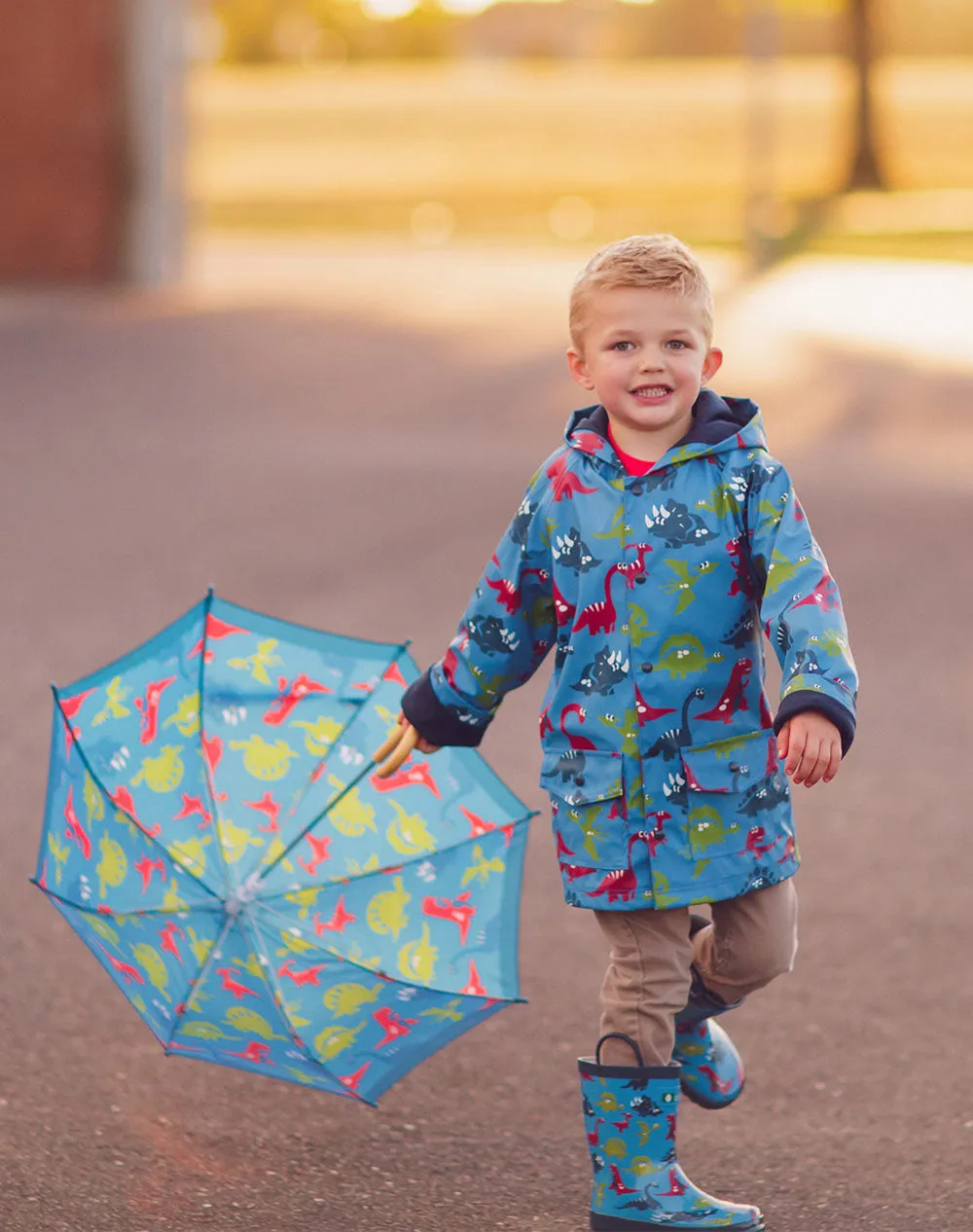 CLEARANCE: Blue Dinosaurs Lined Rain Jacket