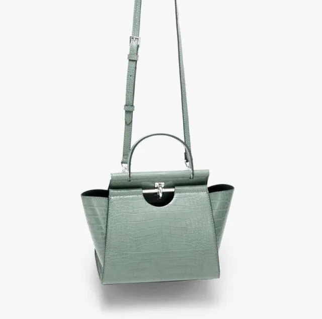 swing bag Women Metal Button Handbag